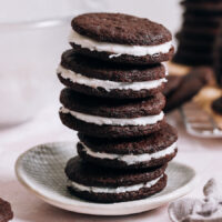 Stack of homemade vegan gluten-free oreos on a plate