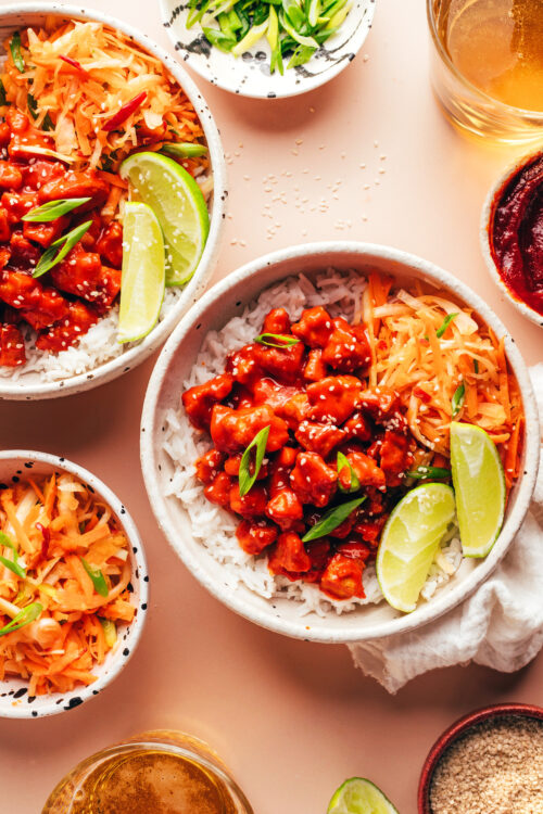 Korean-inspired bowls with gochujang tofu, rice, and kimchi-inspired cabbage apple slaw
