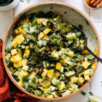Overhead shot of a bowl of shishito pepper mango salsa