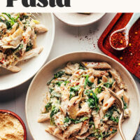Image of creamy vegan spinach artichoke pasta