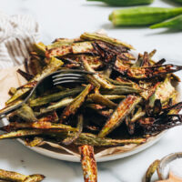 Plate piled high with crispy oven roasted okra