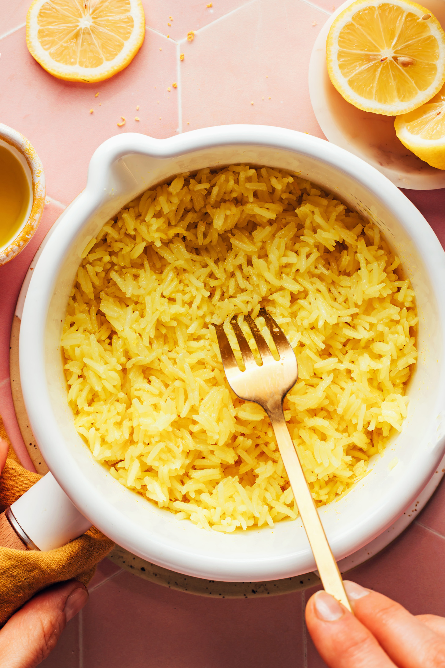Using a fork to fluff rice