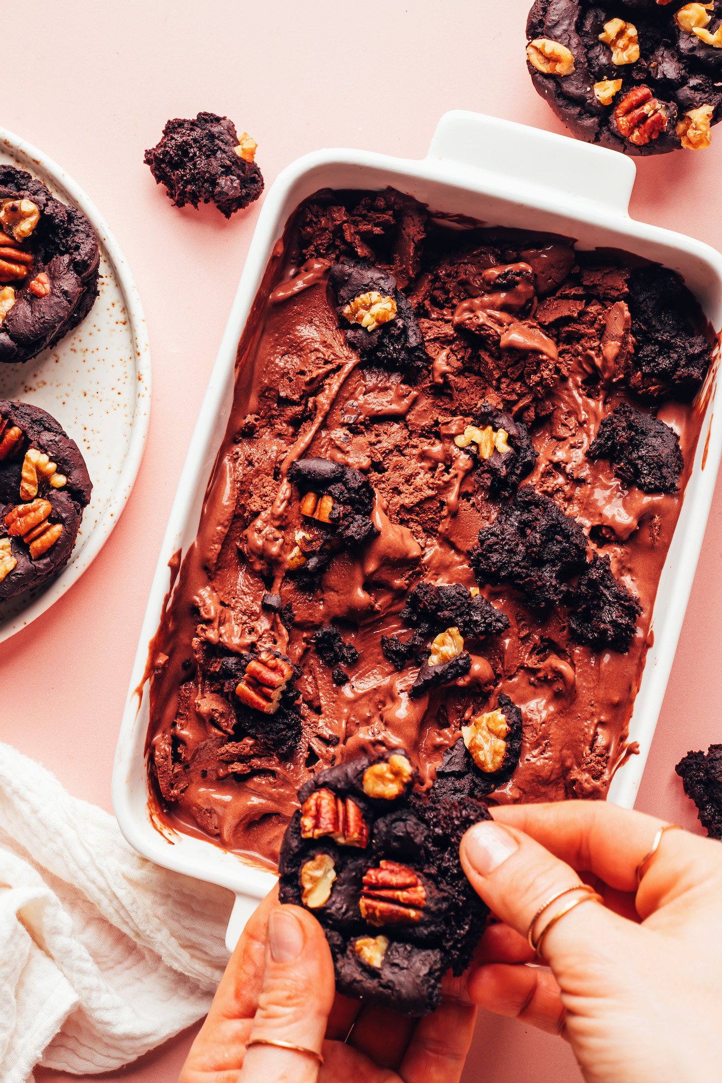 Adding chunks of brownie into homemade chocolate ice cream