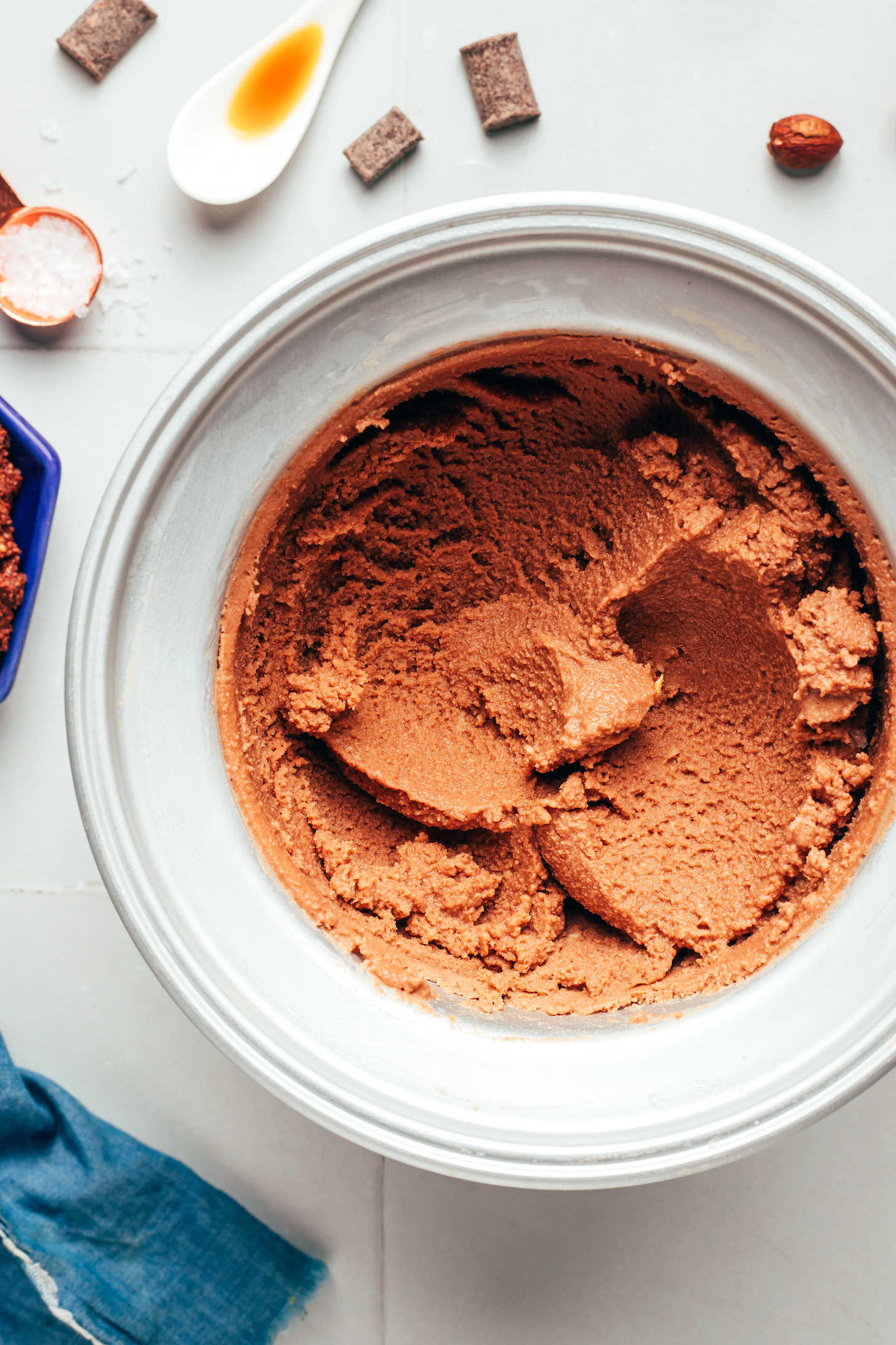 Homemade vegan Nutella ice cream in an ice cream maker right after making it