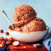 Two scoops of vegan Nutella ice cream in a bowl