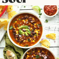 Two bowls of our vegan and gluten-free Chipotle Black Bean Tortilla Soup