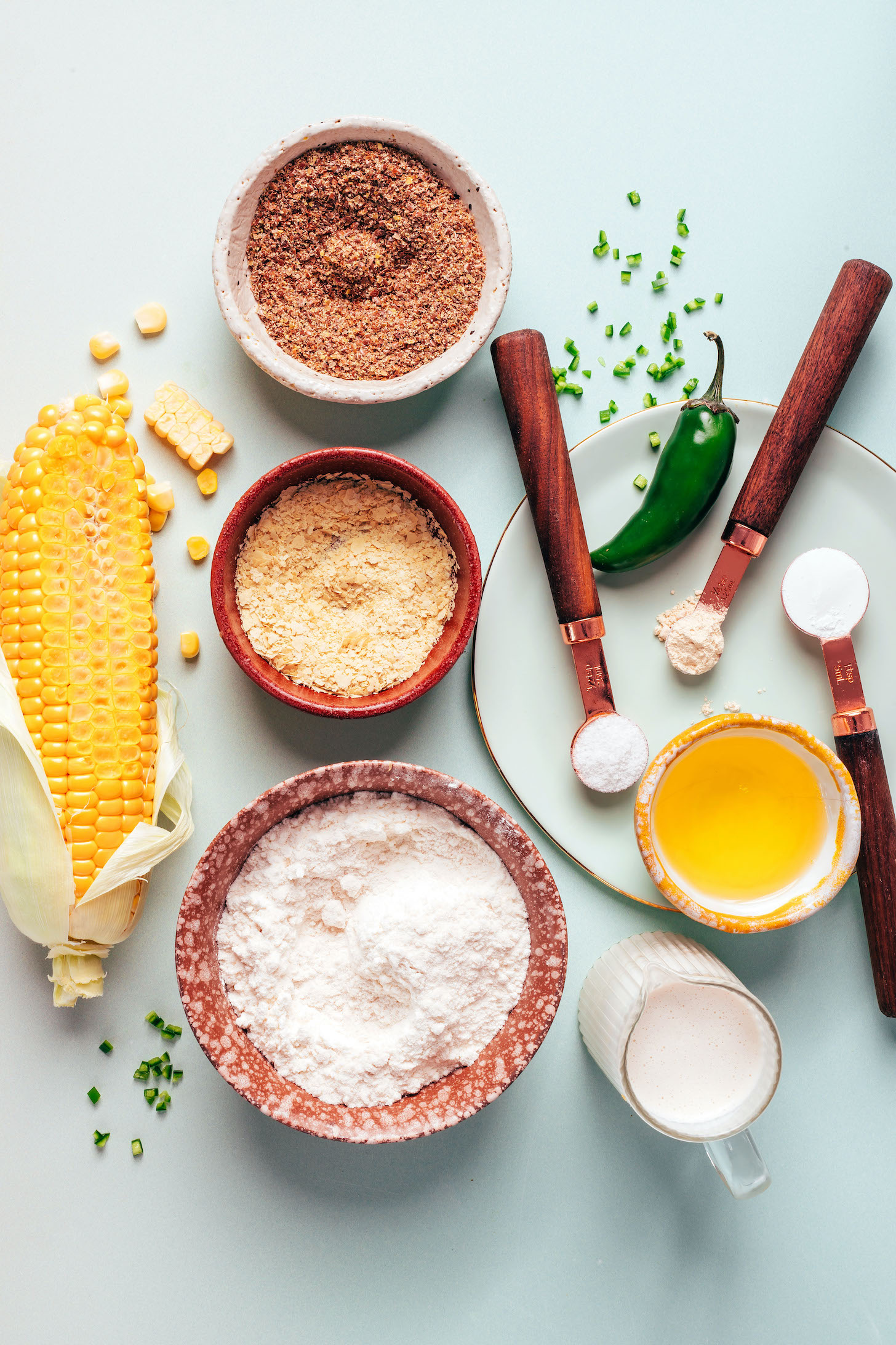 Fresh corn, flaxseed meal, nutritional yeast, gluten-free flour, dairy-free milk, avocado oil, baking powder, garlic powder, salt, and jalapeño