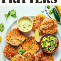 Overhead photo of a plate of our easy jalapeño corn fritters with text above that says vegan and 30 minutes